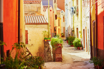 Colorful houses on a street of Bosa, Sardinia, Italy