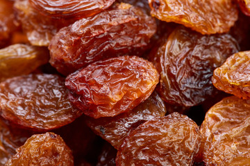 Raisins on a white background. Dried grapes.