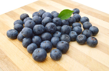 blue berry on wooden board