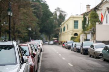 Cars parked on the urban street side