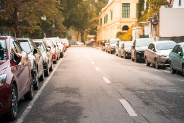 Cars parked on the urban street side