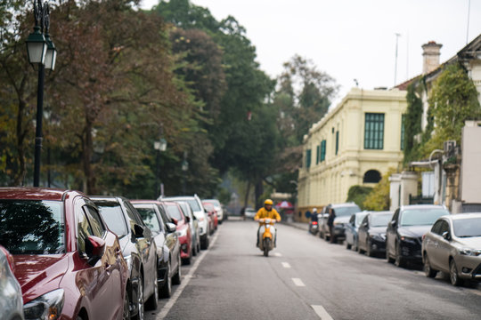 Cars parked on the urban street side