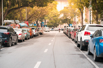 Cars parked on the urban street side