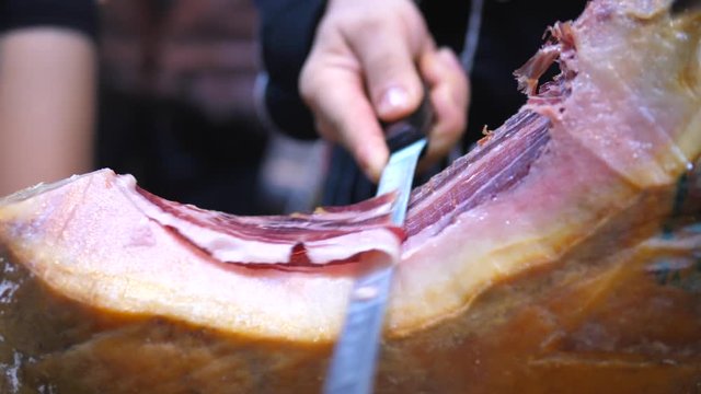 Closeup Of Slicing Luxury Gourmet Spanish Ham. 4K.