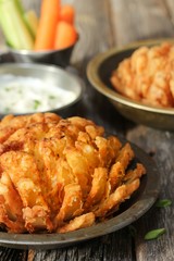 Homemade Blooming Onion with dipping sauce, selective focus