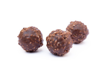 Chocolate ball confection candy isolated on white background