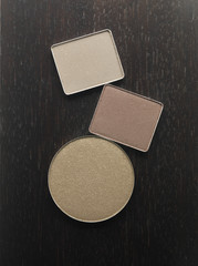 various eye shadows on wood