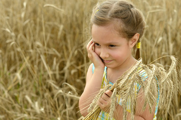 Girl in wheat field