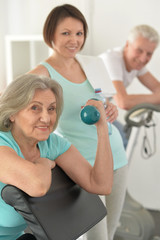  people  exercising in gym