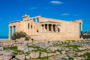 Fototapeta premium The Erechtheion or Erechtheum is an ancient Greek temple on the north side of the Acropolis of Athens in Greece which was dedicated to both Athena and Poseidon