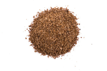 A pile of a  dry coriander powder isolated on white background