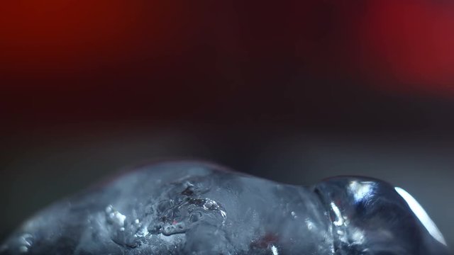 Melting piece of ice close-up time lapse