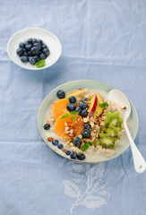 Oatmeal porridge with berries and honey
