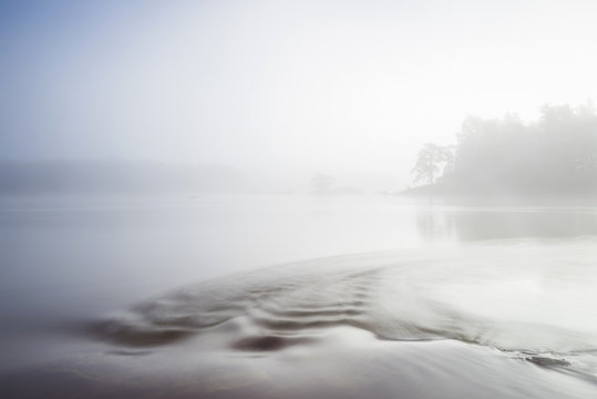 Lake covered in fog