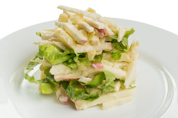 salad of lettuce and apple on a white plate