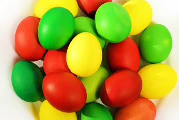 Colorful Easter eggs on white background. Holiday in spring season. top view composition.