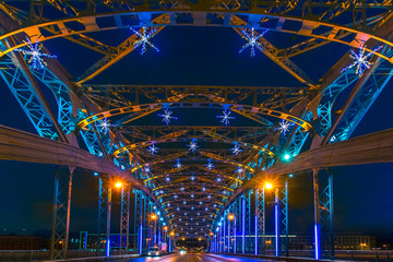 Russia. Bridges of Saint Petersburg. The bridge of Peter the Great across the Nava River. Winter decoration of St. Petersburg. Panorama of the bridge in Russia.