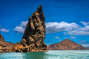 Naklejka premium Ecuador. The Galapagos Islands. View from the water to the bay of the Bartolome Island
