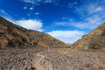 High Atlas Mountains. Walking hiking trail. Morocco, winter. Wild nature landscape.