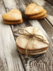 Delicious cookies on the valentine's day. Lovely heart shaped a shortcake dough for valentines. Homemade baking. Flat lay. Top view.