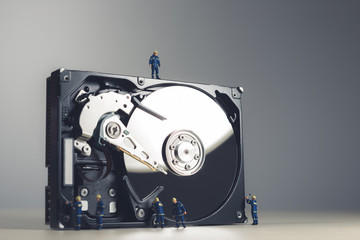 Maintenance and repairing of HDD. Technology concept