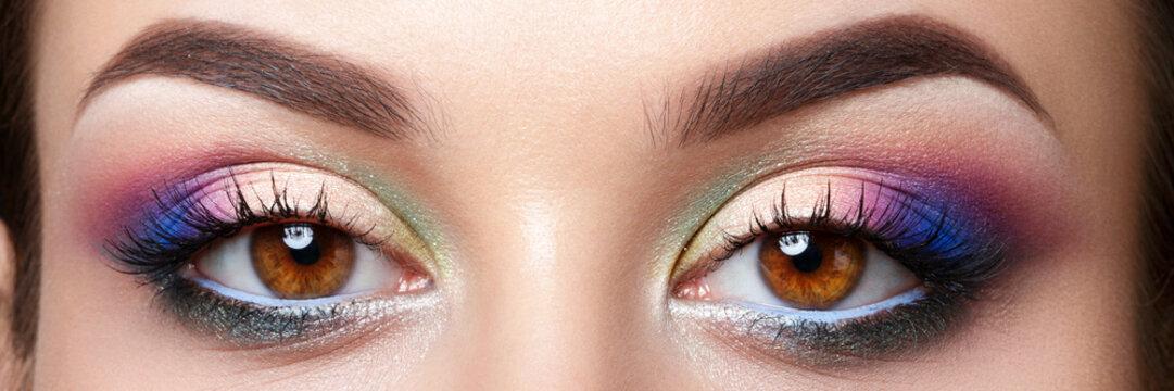 Fototapeta Closeup view of woman eyes with evening makeup