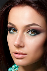 Fototapeta premium Closeup portrait of young beautiful woman