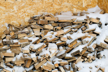 A stack of wooden firewood.