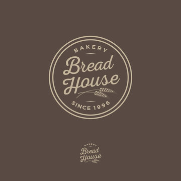 Bakery logo. Bread Shop emblem. Lettering and spikelet in a circular badge.