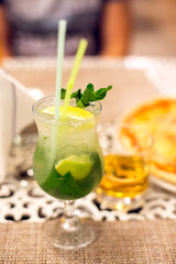 Fresh Mojito cocktail with lime and mint