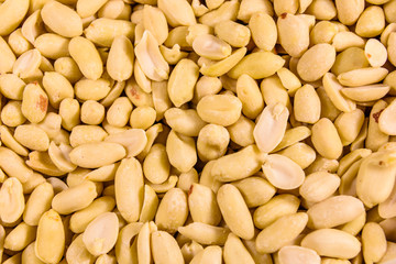 Texture of peeled roasted peanuts for the background