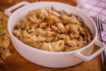 square pasta shape dish with cabbage and bacon traditional in central eastern europe 