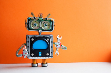 Robot handyman with hand wrench light bulb. Fixing maintenance concept. Creative design mechanic...