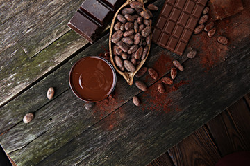 Melting chocolate or melted chocolate and chocolate swirl. stack and powder