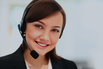 Portrait of happy smiling cheerful support phone operator.