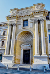 Fototapeta premium A yellow and white church with columns in Parma in Italy. HDR effect.