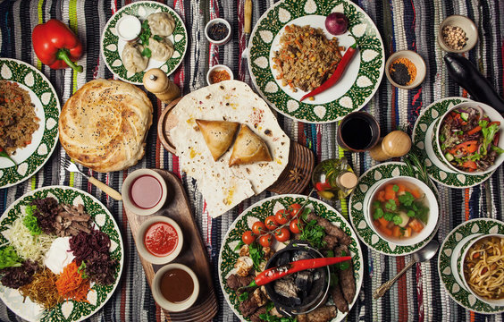 Asian Uzbek different dishes shurpa, shish, kebab, samsa, manti, Lagman