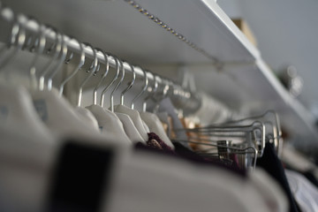 Selective focus row of cloth hangers