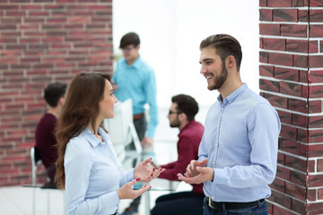 Business people are discussing in the office.