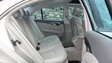 Leather interior design, car passenger and driver seats, clean, angle view side, sunroof solar, buttons, dashboard, nappa leather, beige.