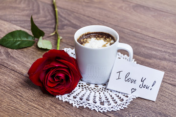 coffee cup with red rose and i love you message card