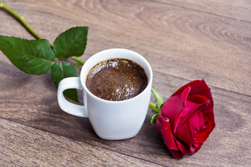 Coffee with red rose