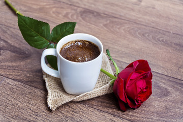 Cup of Coffee and  red rose for valentine's day
