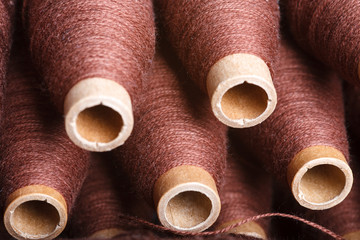 Coils of brown woolen thread