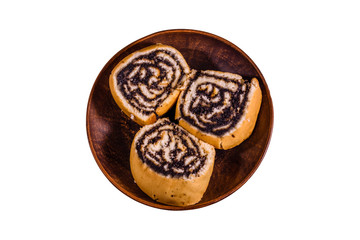 Ceramic plate with poppy seed buns isolated on a white background