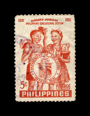 students with books, 50th anniversary of the Philippines Educational System (1951), circa 1952, vintage postal stamp isolated on black background