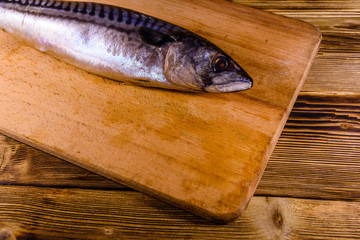 Salted scomber fish on a cutting board