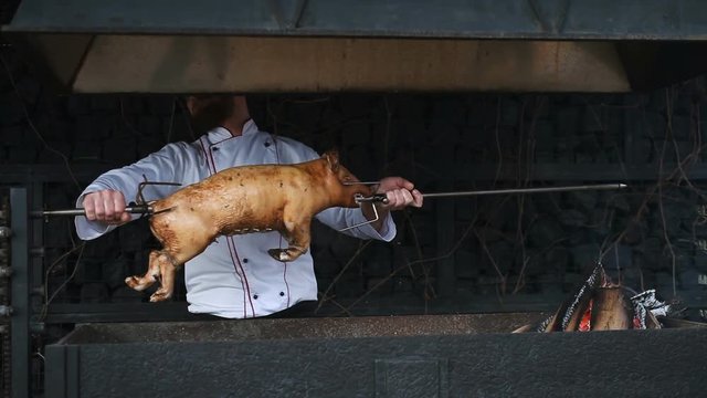 Preparation for cooking a pig on a spit