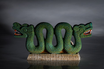 Indigenous cultures and native american tribe heritage concept with an Aztec double headed serpent...