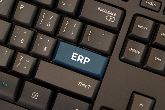 Enterprise resource planing (ERP) concept on blue button on keyboard